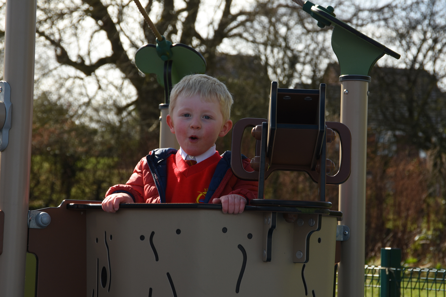 A Manor Hill First School nursery pupil enjoying playing on our outdoor play equipment. 
